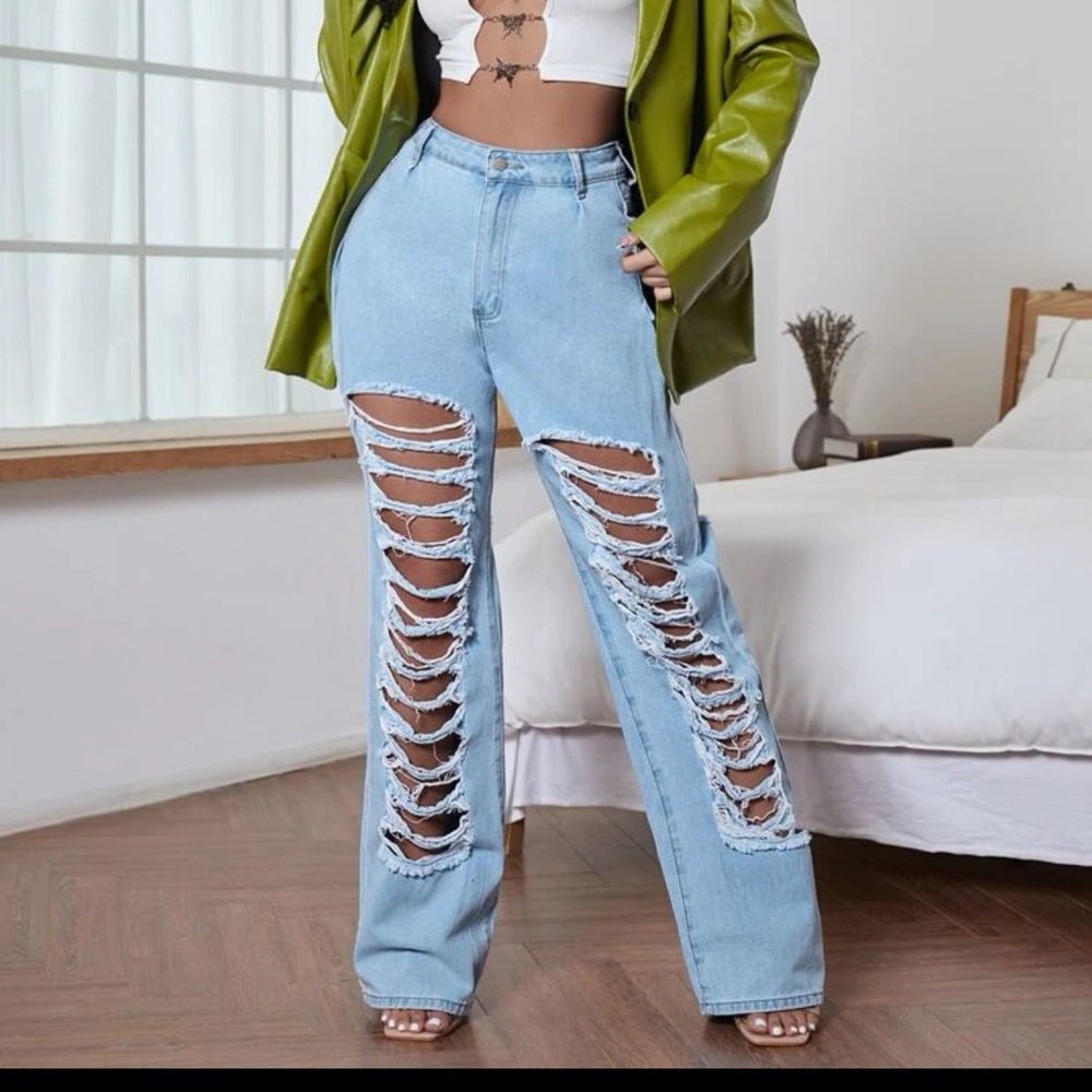 Brand new,never worn SHEIN High Waist Cut Out Flare Leg Jeans. Light Wash color